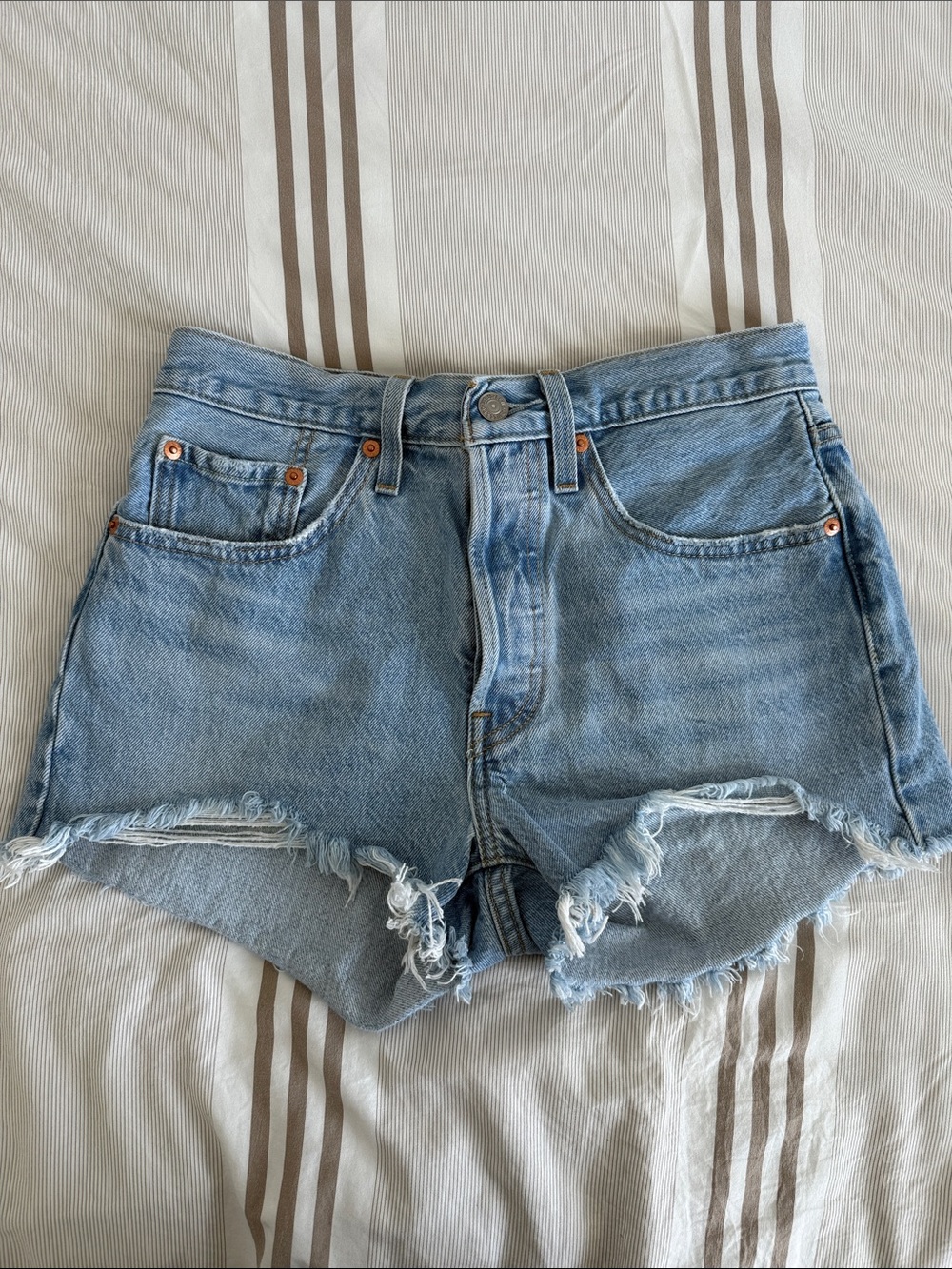 Levi's Medium Light Blue Distressed Fringe High-Rise Button Up Denim Shorts